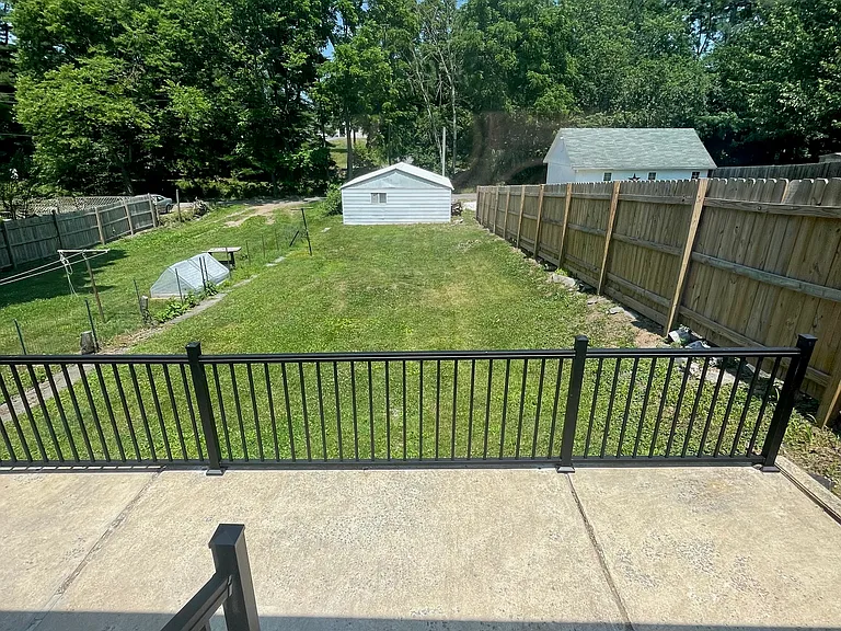 Shared yard with optional garage available for rent.