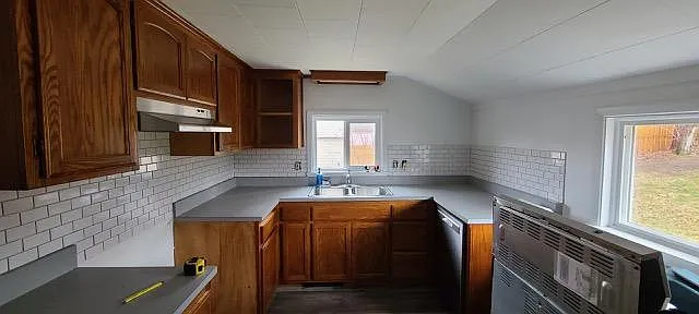 Stainless steel electric stove, dishwasher, refrigerator and microwave included