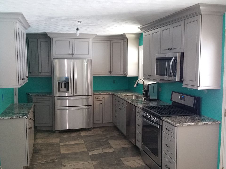 Custom cabinets with level 12  Granite countertops