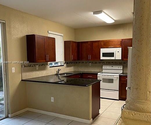 2nd image of 6970 NW 177th St #M104
