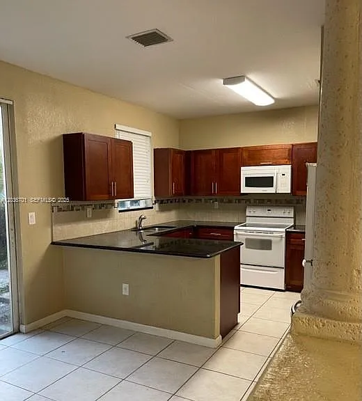 6970 NW 177th St #M104 — Photo 2