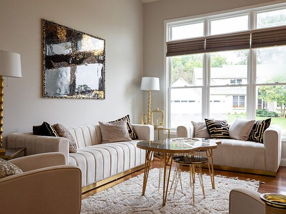 Formal living room with hard wood flooring