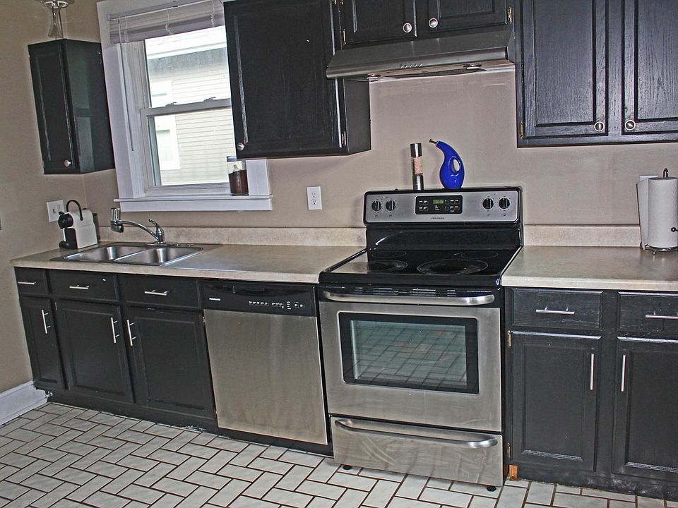 Check out your new kitchen with beautiful herringbone tile, vaulted ceilings, pantry, and all-stainless steel appliances.