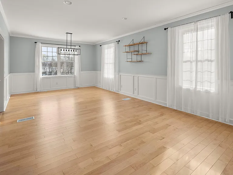 Formal sitting area and dining room.