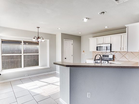 4th image of 613 Prairie Gulch Dr