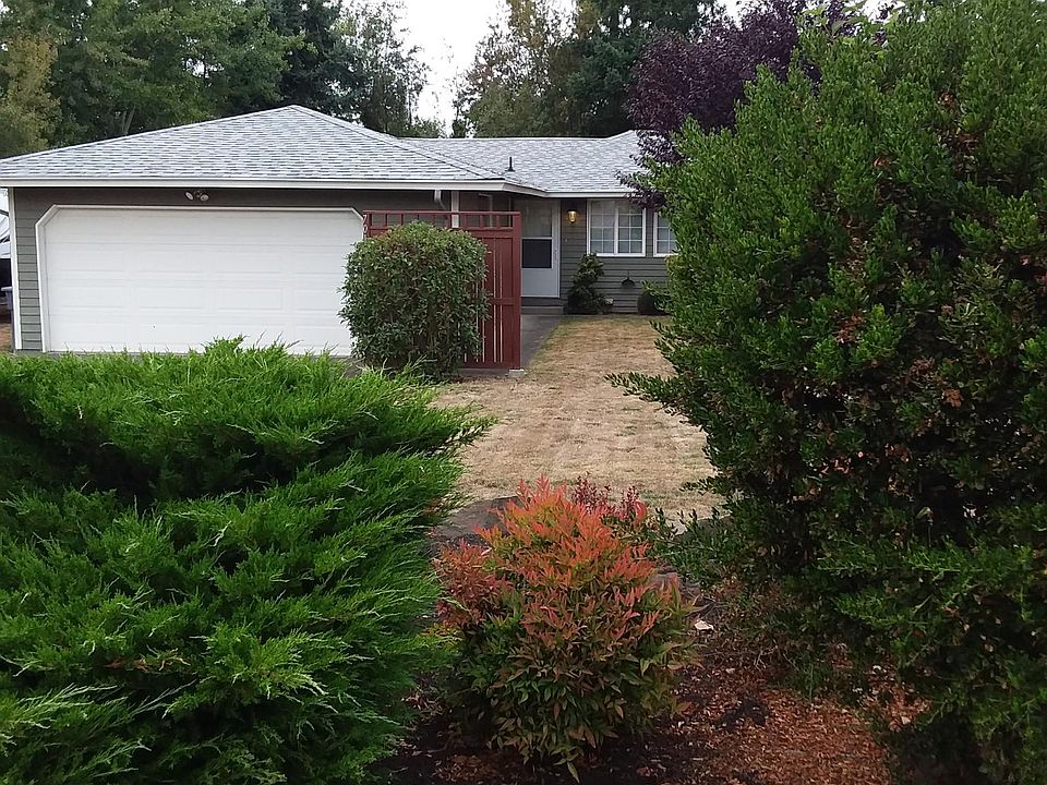 Front yard showing two car attached garage