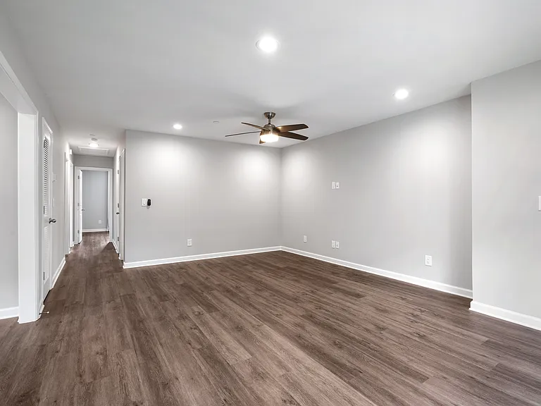 Follow the cozy hallway to the restful bedroom spaces.
