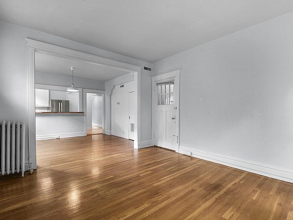 Living Room looking into the Dining Room and Kitchen