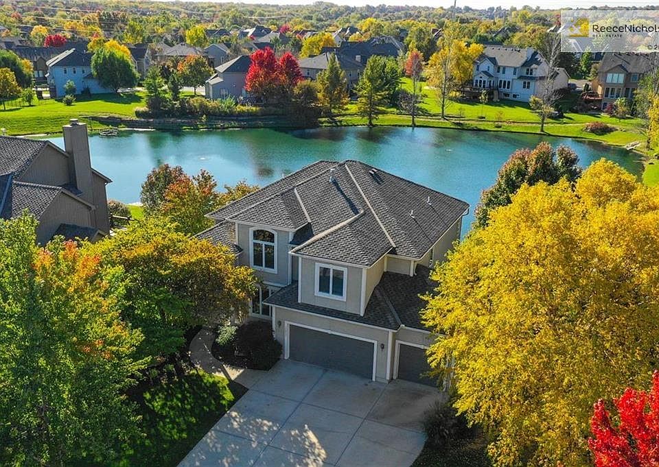 Enjoy beautiful lake views from your home in the heart of Overland Park with your very own lake front property!
