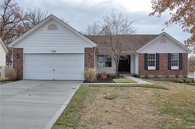 Beautiful, updated walk out ranch with nearly 2000 sq ft on main level! New driveway & sidewalk