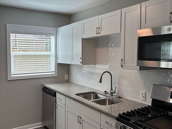 Dishwasher, hands-free faucet, stove, and built-in microwave