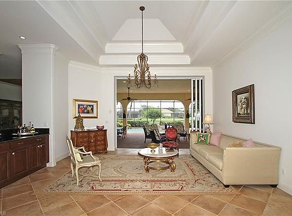 Lovely Living Room, Wet Bar, View to Pool, Lanai & Lake.