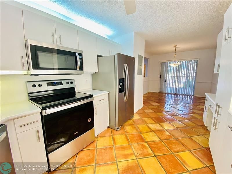 1st image of 7646 Granville Dr #212