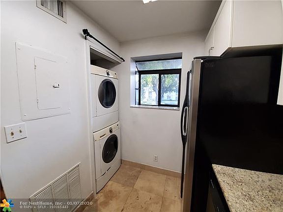 4th image of 704 Gardens Dr APT 203