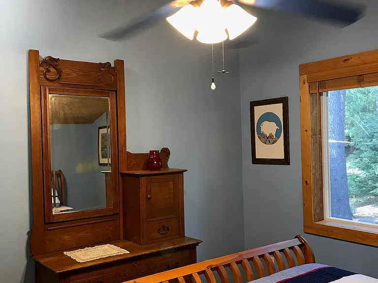 Bedroom antique dresser with mirror and 3 drawers.