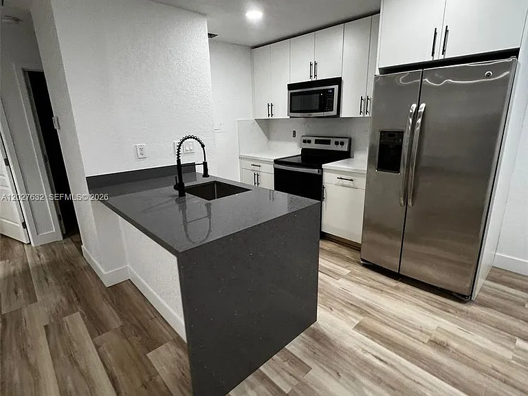 15669 SW 73rd Circle Ter #412 — Photo 1