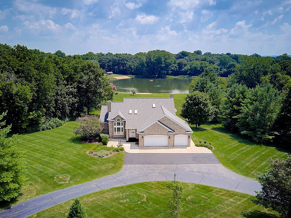 This home features a New Roof, Siding and Fascia in 2017.  Home sits on 1.74 Acres of land on a Private Beach in Hidden Lakes Estate!  Very Rarely do these home go up for sale.  Views are incredible!