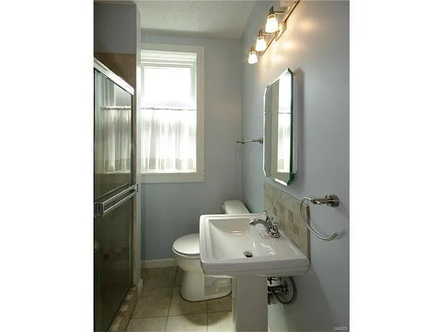 Building Photo - 6025 Carlsbad Ave #2F