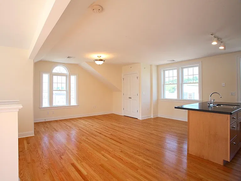 Living space, edge of kitchen area