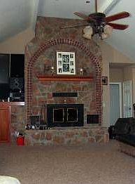 Native rock completely vented fireplace