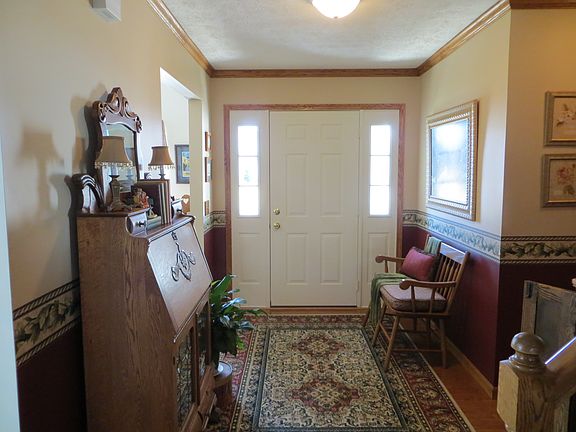 Foyer with hardwood floor