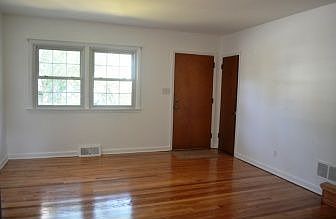 Enter into the Living Room w Gleaming Floors