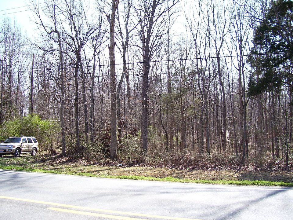 200 feet of road frontage with long gravel drive.