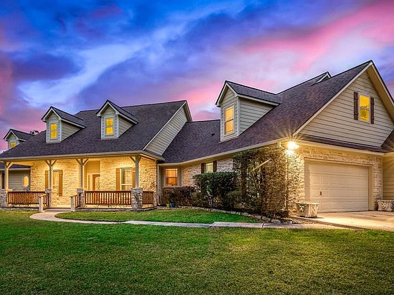 Beautiful front elevation - true oversized three car garage!