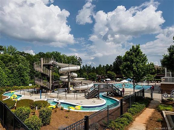 Neighborhood pool, slides, 3 tennis courts