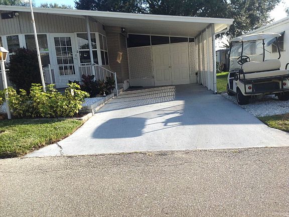 Parking for 2 plus side for Golf Cart
