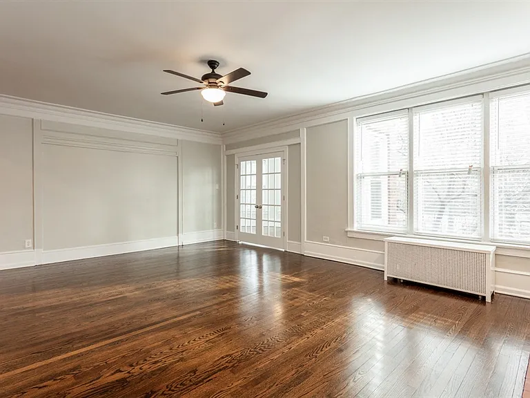 Living Room - Gray Turnover & Hardwood Floor