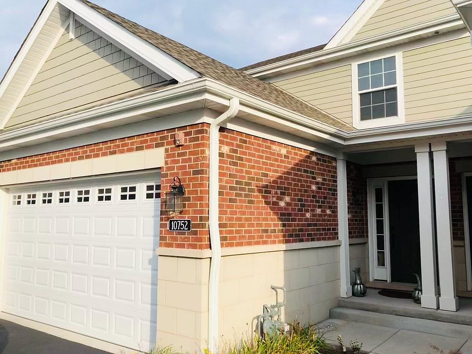 Attached garage with 2 spaces, private driveway.