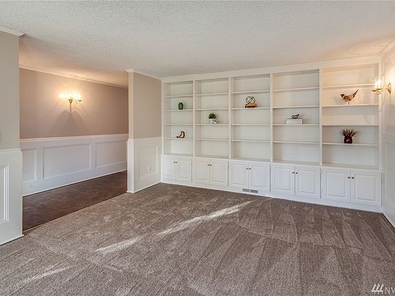Built-in shelves and cabinets in the living room
