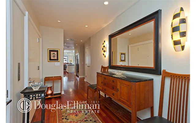 Sold by Douglas Elliman | media 18