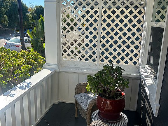 Front Porch (includes 4 chairs, planter and plants)