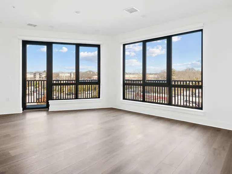 Living Room with Balcony and Hard Surface Flooring