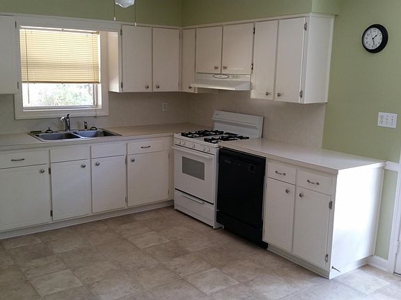 Kitchen with breakfast table area.