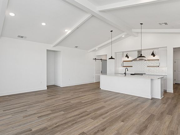 Dining area with vaulted ceiling