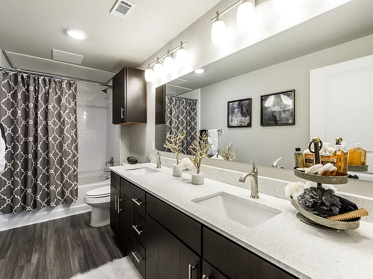 Master bathroom with wood-style flooring, and double vanity