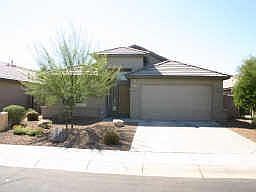 Frontal view. North/South Exposure.  Backs up to park-like common area.