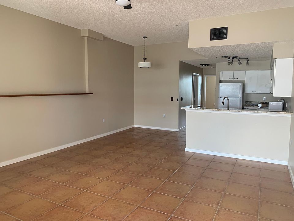 1st image of 701 Mirror Lake Dr N APT 404