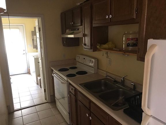 Kitchen and doorway into laundry room/back entry.