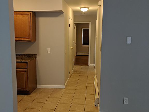 Hallway to bedrooms from living room