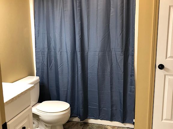 Bathroom tiled floor and new vanity