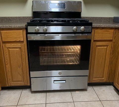 Gas cooking range - stainless