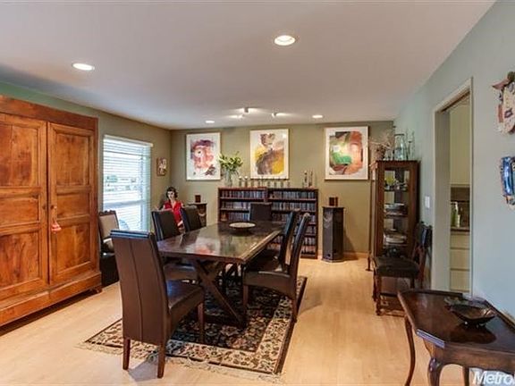 The formal dining area adjoins the kitchen, but can be separated by a pocket door.