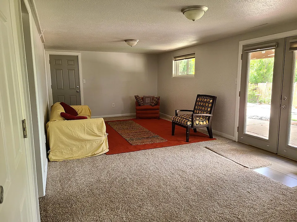 Great room has lots of sunlight. Private. Furnished but there's plenty of room for you to add.