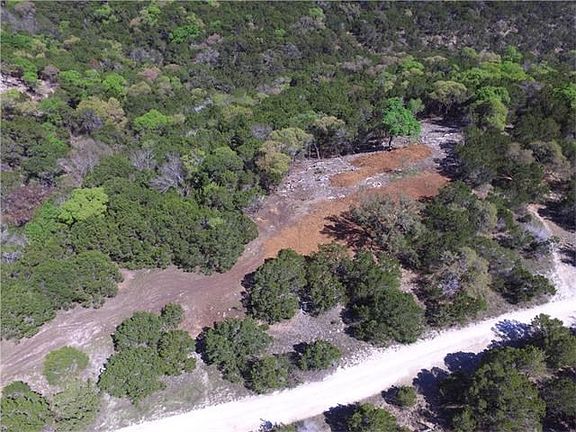 Backing to a wooded preserve, 2.66 Acres offers Panorama and Privacy in the Heart of Lakeway.