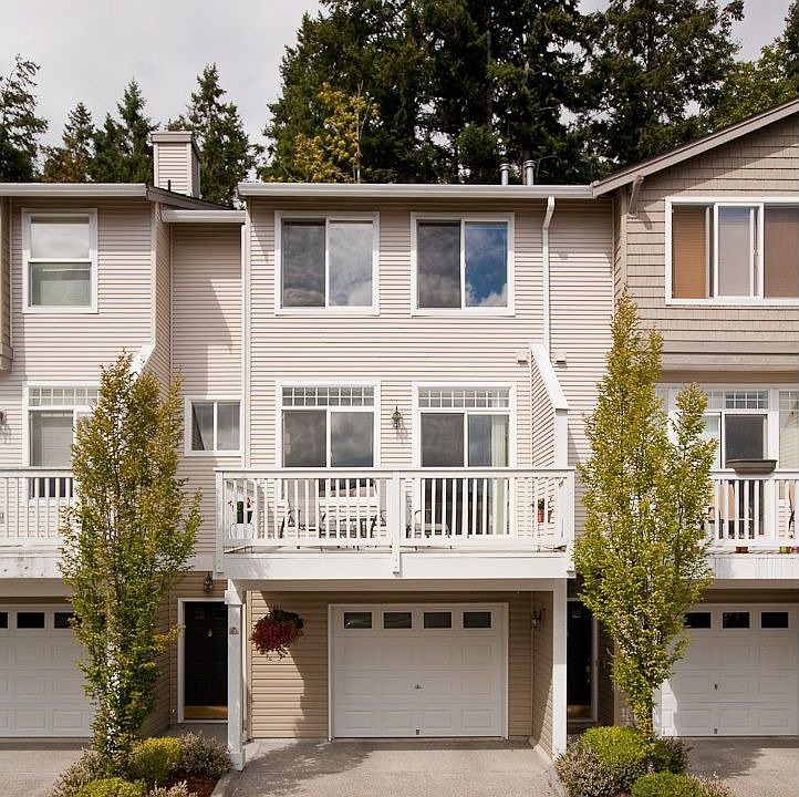 Welcome to your new condo townhome! Tandem garage fits 2 cars, lots of storage