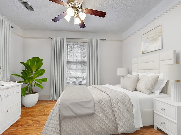 Spacious back bedroom. Fits Queen sized bed and plenty of other furniture. No furniture included